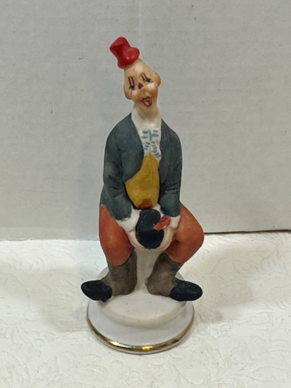 VTG Porcelain Hobo Circus Clown Figurine Hand-Painted Sitting Red Hat 2"x6.5"